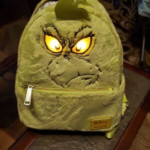 Loungefly Green Grinch Backpack with Glowing Eyes
